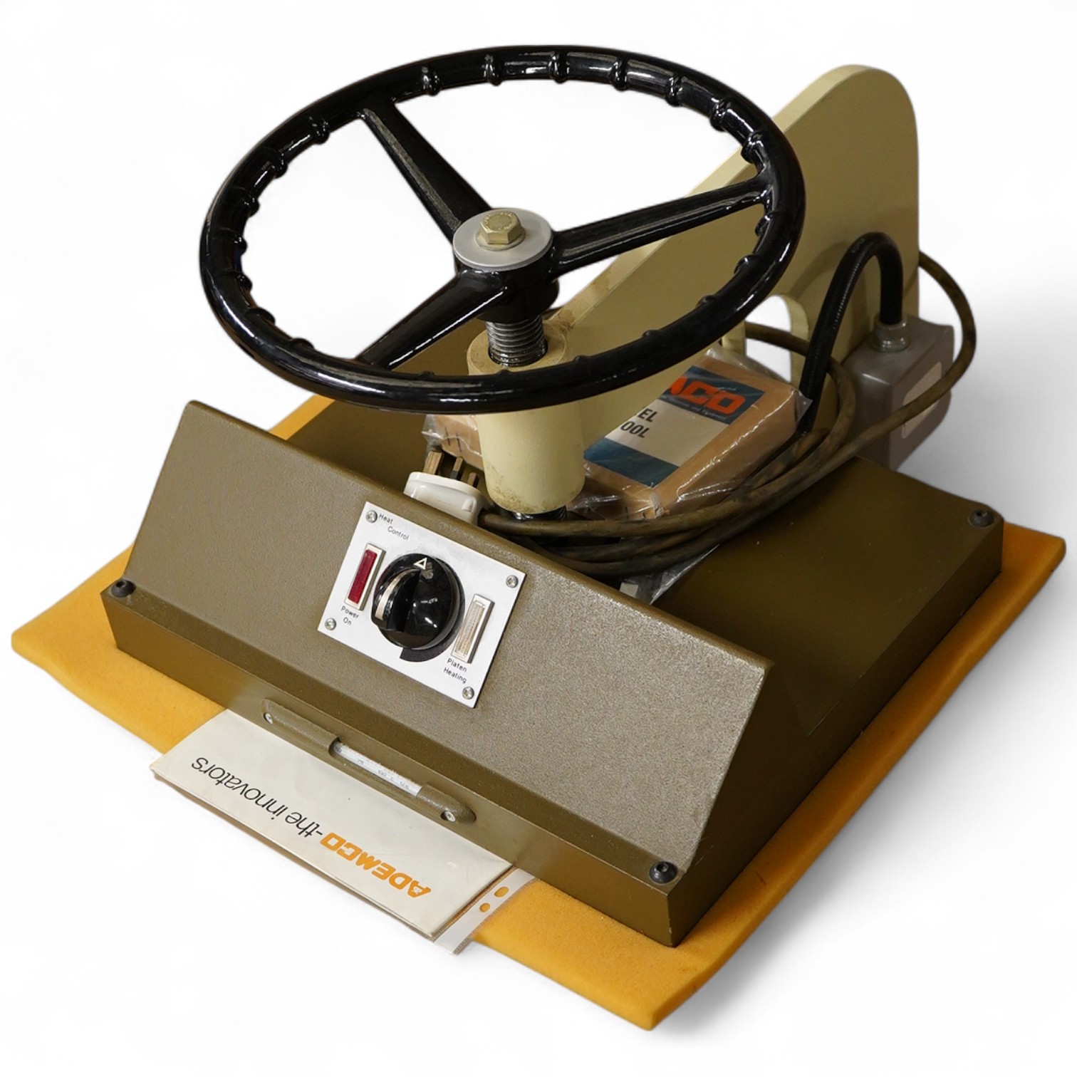A collection of framing equipment to include Ademco heat press, C & H Bainbridge oval master mount cutter, Longridge baseboard, various mount and backing boards, tools, cutters, clamps and point drivers, many with instru